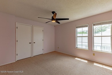 This two-story condo has high vaulted ceilings, skylights, and a - photo 34