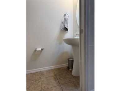 This beautiful townhouse is located in the gated community of - photo 12