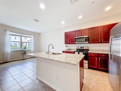 This beautiful townhouse is located in the gated community of - photo 14