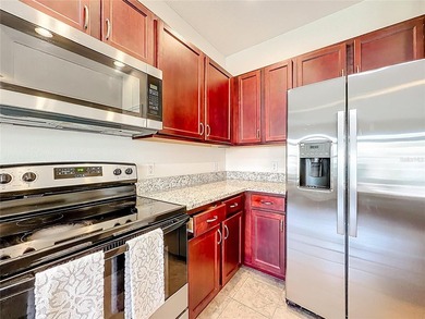 This beautiful townhouse is located in the gated community of - photo 16