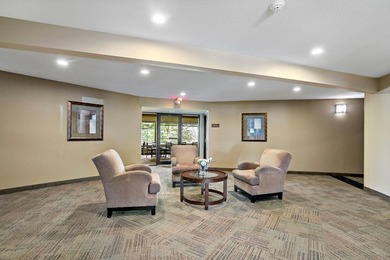 Welcome home to effortless, maintenance-free living in highly - photo 2