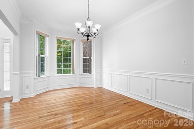 Big and beautiful, this impressive home sits proudly on an - photo 6