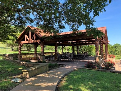 Experience lakeside living in the exclusive, gated community of - photo 11
