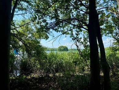 Experience lakeside living in the exclusive, gated community of - photo 21