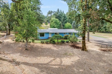 Nestled on nearly 3 acres, this welcoming ranch home has 3 - photo 2