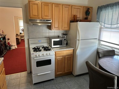 Spacious two-story detached legal 2 family home on a corner lot - photo 4