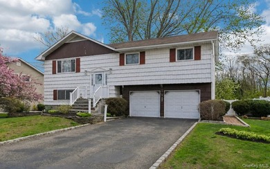 Welcome to this spacious 4-bedroom, 1.5-bath high ranch nestled - photo 1