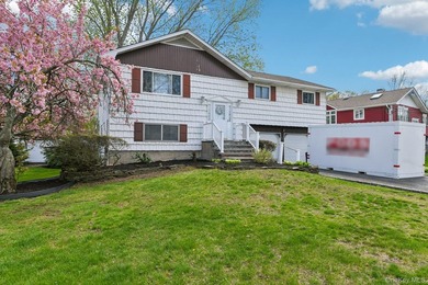 Welcome to this spacious 4-bedroom, 1.5-bath high ranch nestled - photo 4