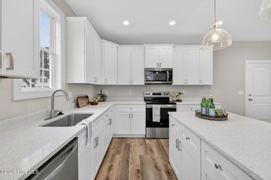New construction on a premium corner homesite near the end of a - photo 12