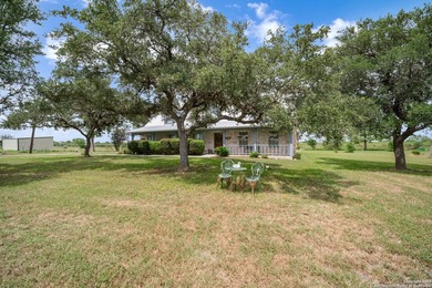 Discover the charm and potential of this 66-acre farm and ranch - photo 3