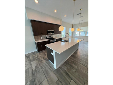 Virtually Staged. Welcome to this beautifully designed townhouse - photo 11