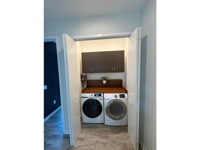 Virtually Staged. Welcome to this beautifully designed townhouse - photo 14