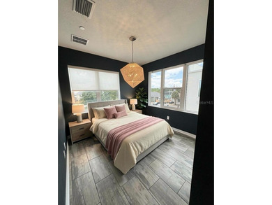 Virtually Staged. Welcome to this beautifully designed townhouse - photo 24