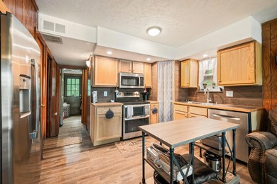 Escape to the quiet side of lake living. This 3-bedroom, 2-bath - photo 13