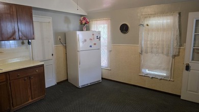 Enjoy the convenience of one-story living in this charming - photo 3
