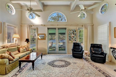 Stunning lake views on 3 sides & beautifully landscaped, this - photo 5