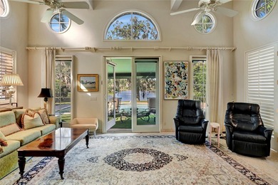Stunning lake views on 3 sides & beautifully landscaped, this - photo 6