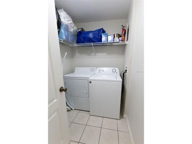 Welcome to this charming first-floor end-unit condominium - photo 12