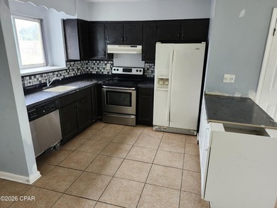 This home offers solid potential and good bones. Townhome - photo 14