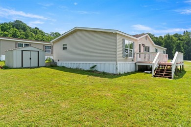 Welcome to this spacious 4-bedroom, 2-bath manufactured home - photo 3