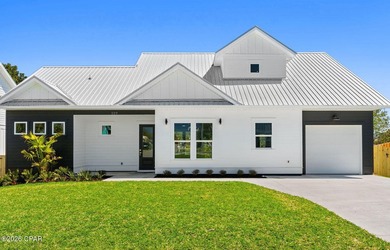 Waterfront Luxury on Lullwater Lake - Brand New Home with up to - photo 1