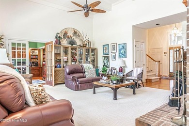 Located in the Pinehurst No. 6 neighborhood, this custom-built - photo 9