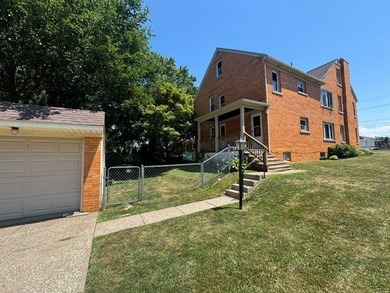Beautiful brick two unit near the VA that has a two-car detached - photo 3
