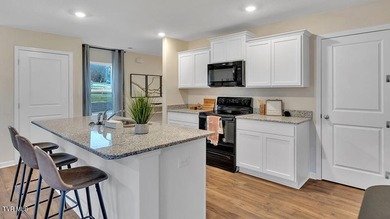 The Elston floorplan at the Hideaway at Fox Meadows in Bluff - photo 3