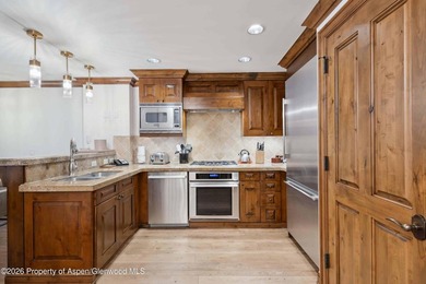 Recently refreshed in 2024, this 3 BR residence features updated - photo 4