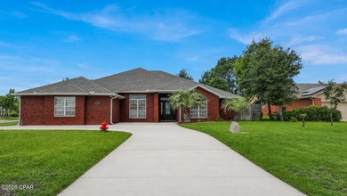 This CUSTOM all brick one level 4 bedroom 3.5 bath home with - photo 3