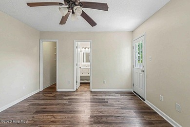 New roof, new LVP (no carpet!), and fresh paint welcome you home - photo 18