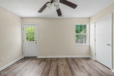 New roof, new LVP (no carpet!), and fresh paint welcome you home - photo 19