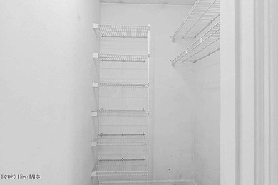 New roof, new LVP (no carpet!), and fresh paint welcome you home - photo 20