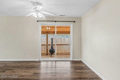 New roof, new LVP (no carpet!), and fresh paint welcome you home - photo 22