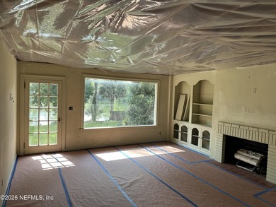 Lakefront views and exceptional privacy on a 1.4-acre lot can be - photo 12