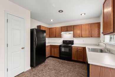 Welcome home! Ideally situated on a large corner lot with - photo 13