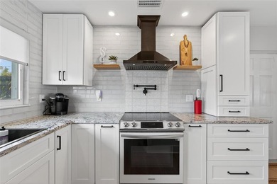 Live the ultimate coastal lifestyle in this beautifully - photo 9