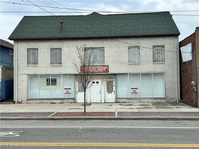 Versatile Retail / Service Building with Income - Prime E. 185th - photo 1