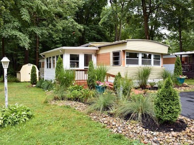 Welcome home to this completely remodeled mobile home featuring - photo 1