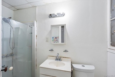 Welcome to this well-maintained 2-family brick home located in - photo 12