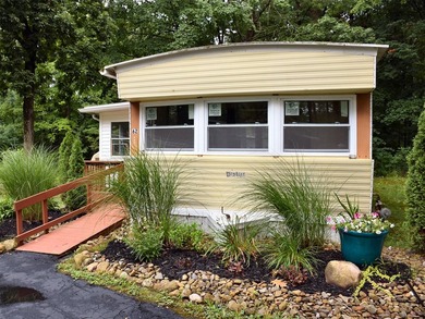 Welcome home to this completely remodeled mobile home featuring - photo 3