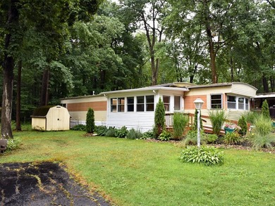 Welcome home to this completely remodeled mobile home featuring - photo 5