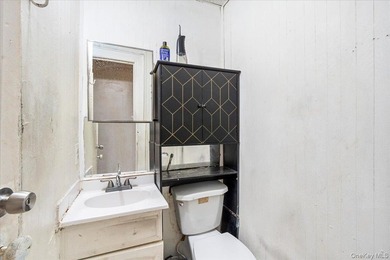 Welcome to this well-maintained 2-family brick home located in - photo 15