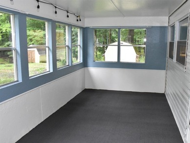 Welcome home to this completely remodeled mobile home featuring - photo 9
