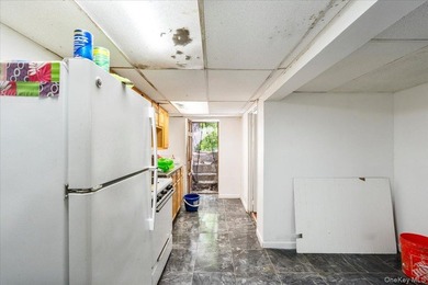 Welcome to this well-maintained 2-family brick home located in - photo 26