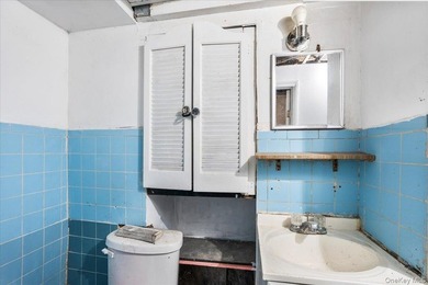 Welcome to this well-maintained 2-family brick home located in - photo 33