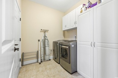Discover exceptional coastal living in this immaculate 4-bedroom - photo 12