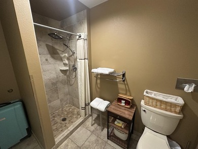 Located on the sixth floor, this spacious three bedroom condo - photo 12