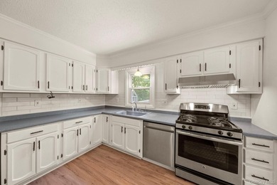 Tucked away on a beautifully wooded and private lot, this - photo 13