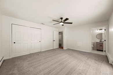 Tucked away on a beautifully wooded and private lot, this - photo 18